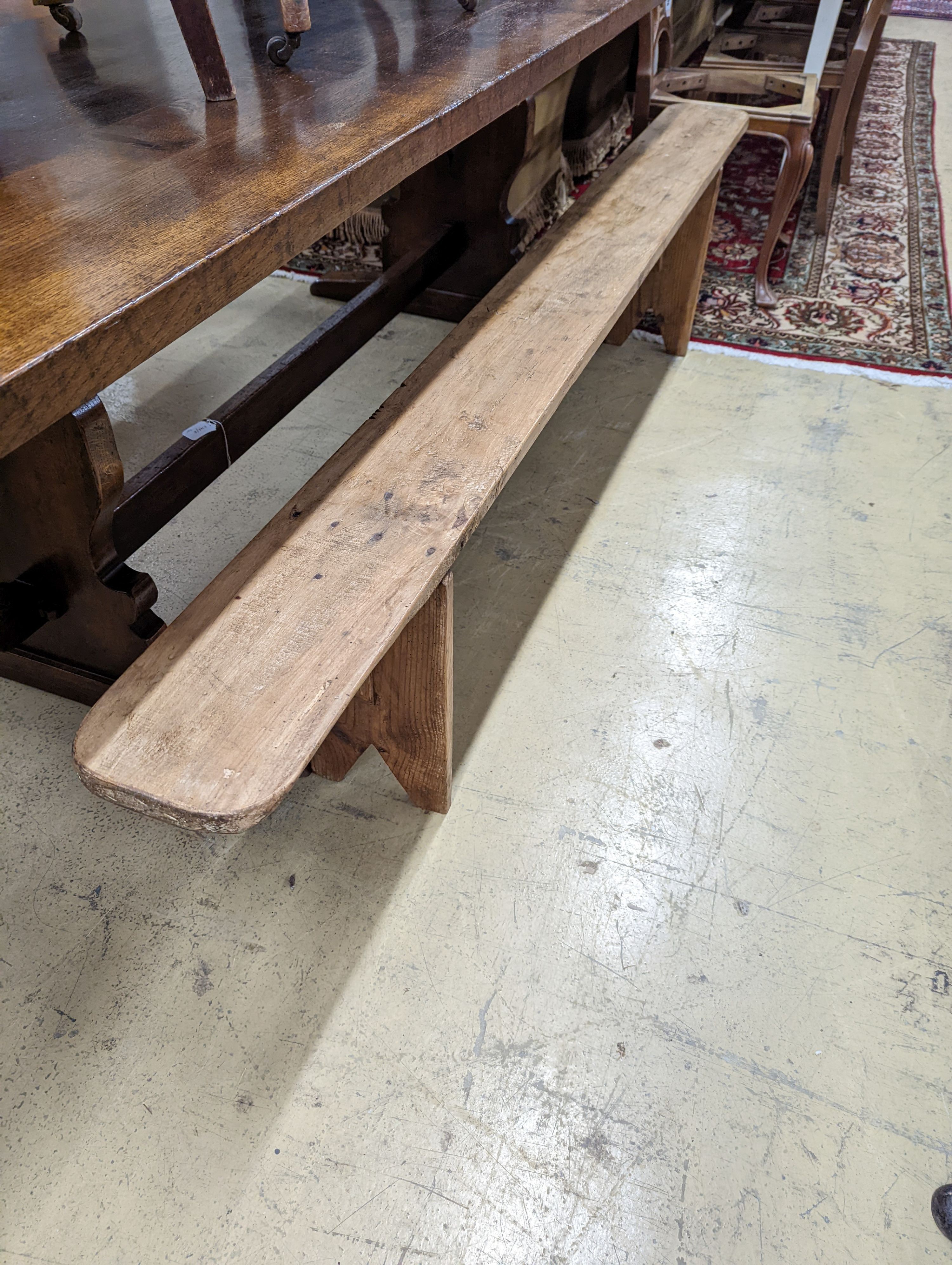 A pair of 19th century pine benches. Length-220cm, Depth-21, Height - 45cm.